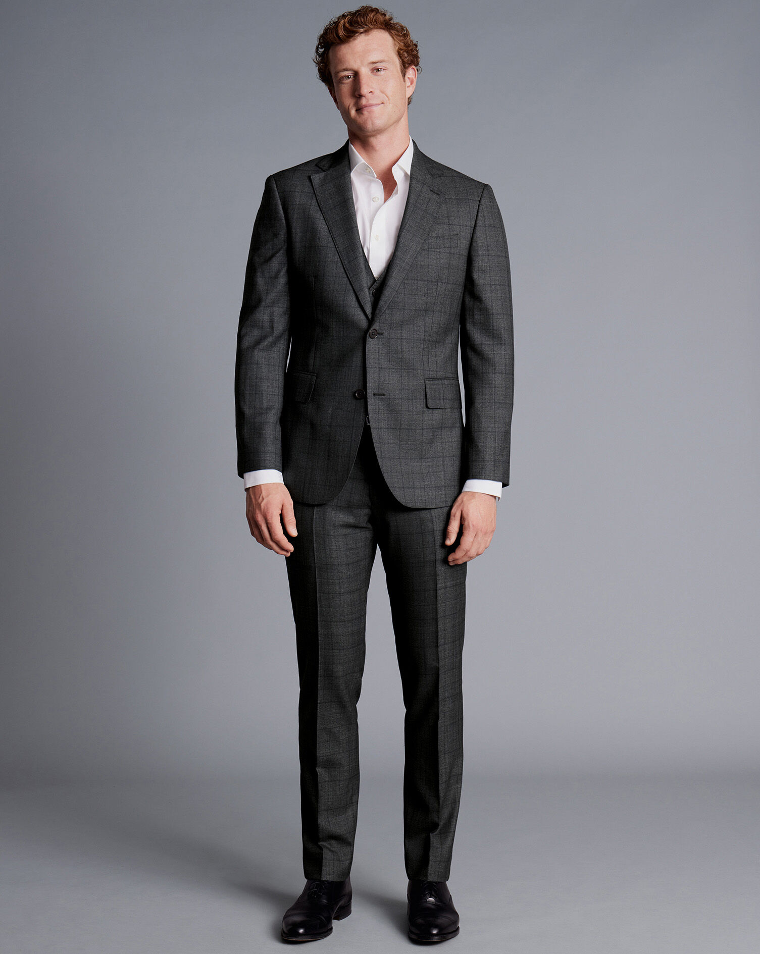 charcoal grey suit with vest