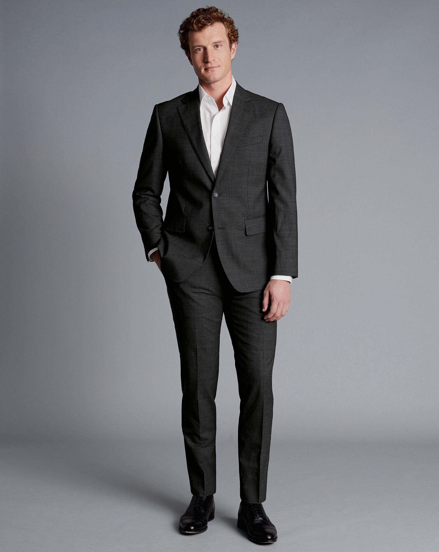 black suit with gray pants