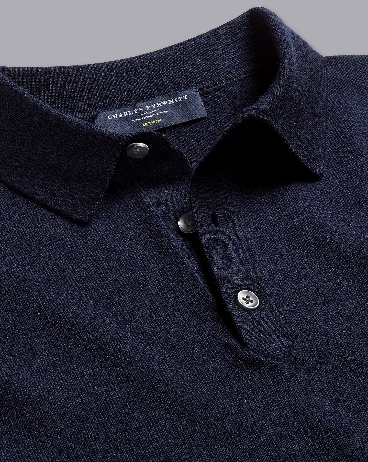 Charles Tyrwhitt Kurzärmeliger Pullover aus Merinowolle mit Polokragen - Marineblau